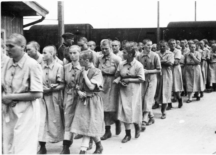 Jewish female inmates marching in the women’s camp in prison clothes. Birkenau. May 27, 1944 (Photo 25) Jewish female inmates marching in the women’s camp in prison clothes. Birkenau. May 27, 1944 (Photo 25)